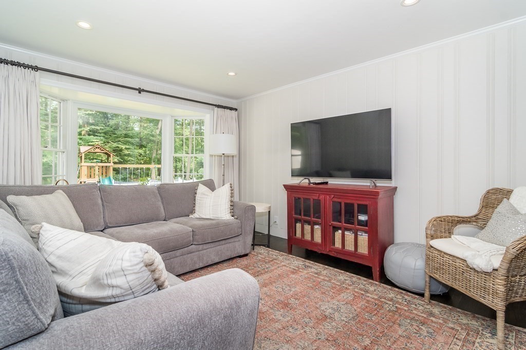 81 Parker Road Wellesley, MA 02482 - Photo 9 of 25 a living room with furniture and a flat screen tv