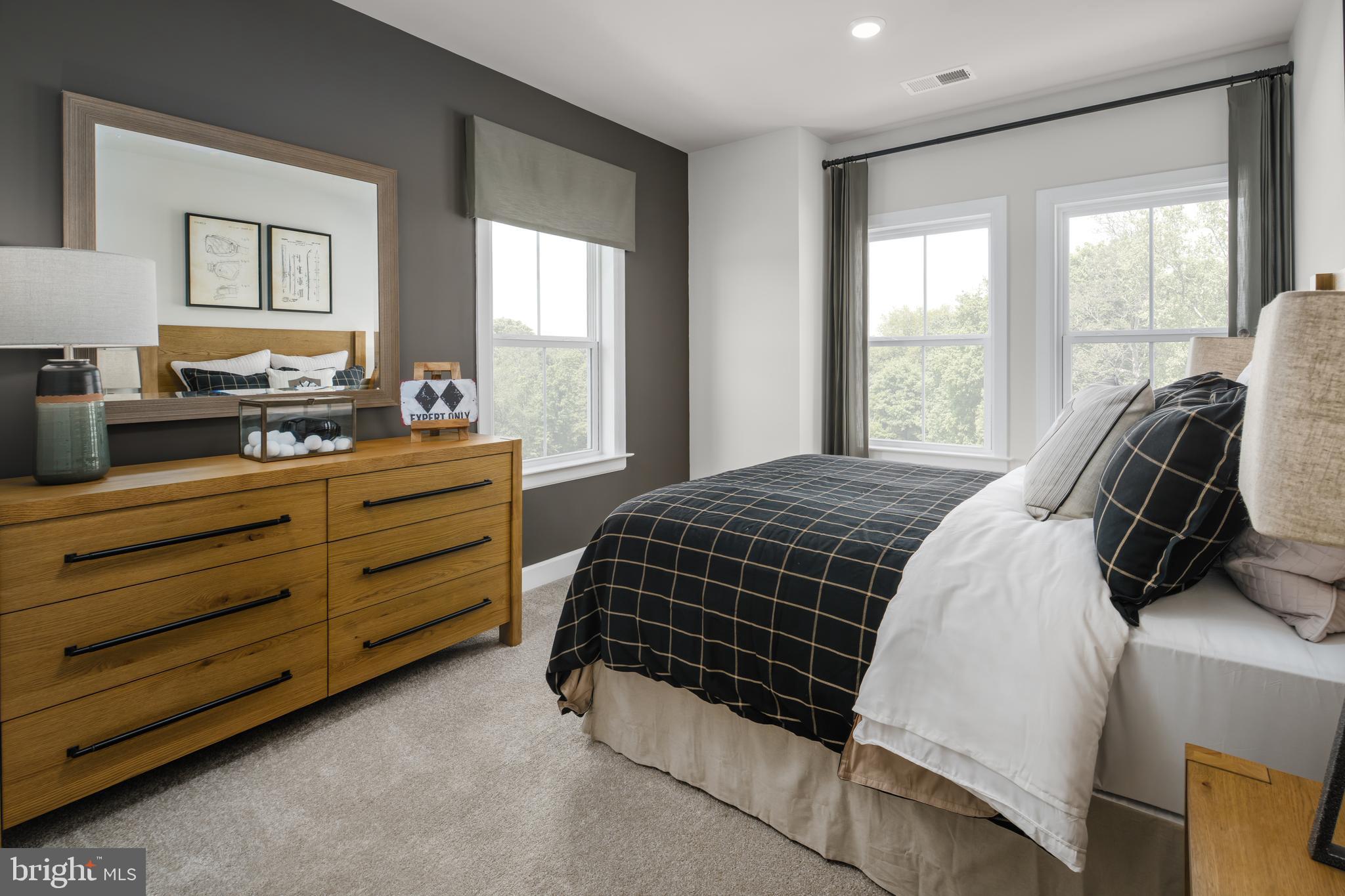9406 Gerst Road Perry Hall, MD 21128 - Photo 15 of 22 a bedroom with a bed and window