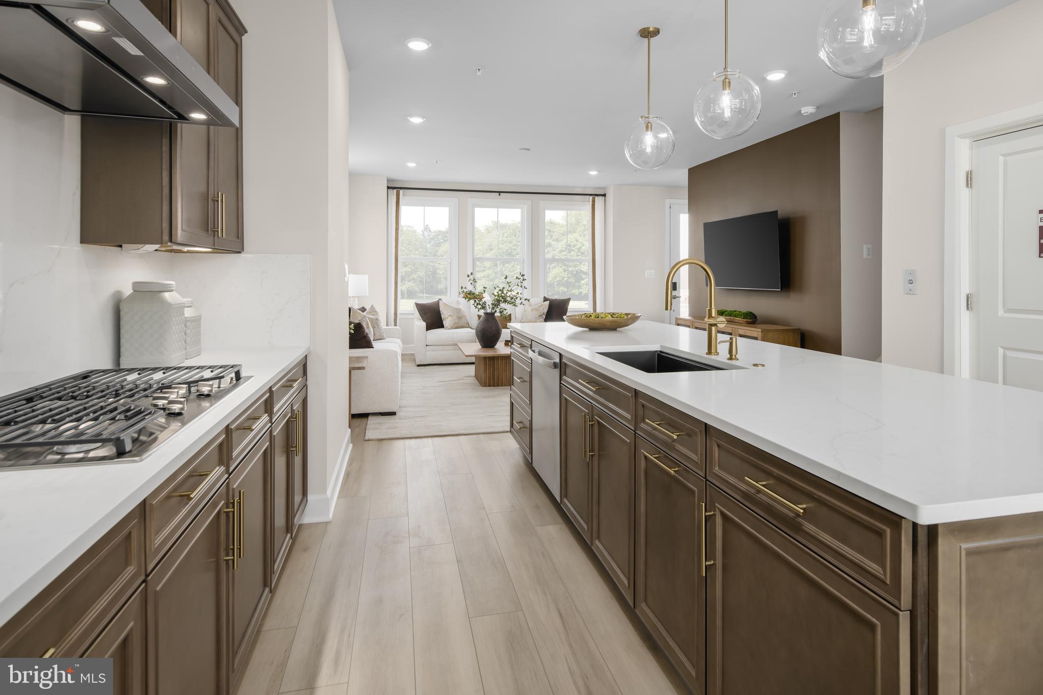 9406 Gerst Road Perry Hall, MD 21128 - Photo 5 of 22 a kitchen with sink stove and refrigerator