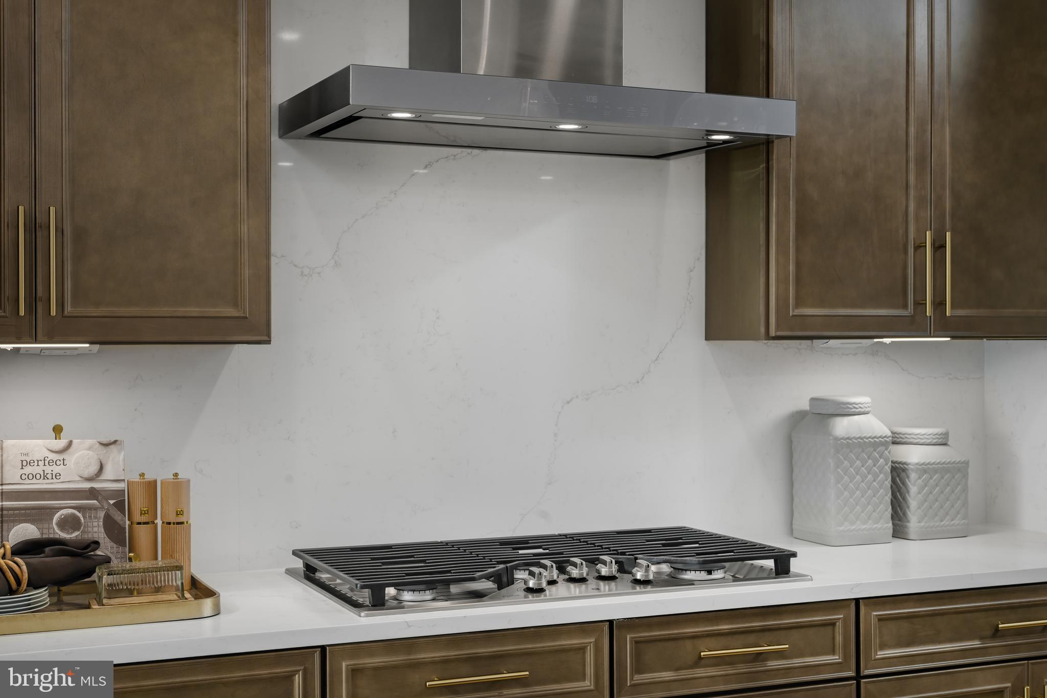 9406 Gerst Road Perry Hall, MD 21128 - Photo 8 of 22 a stove top oven sitting inside of a kitchen