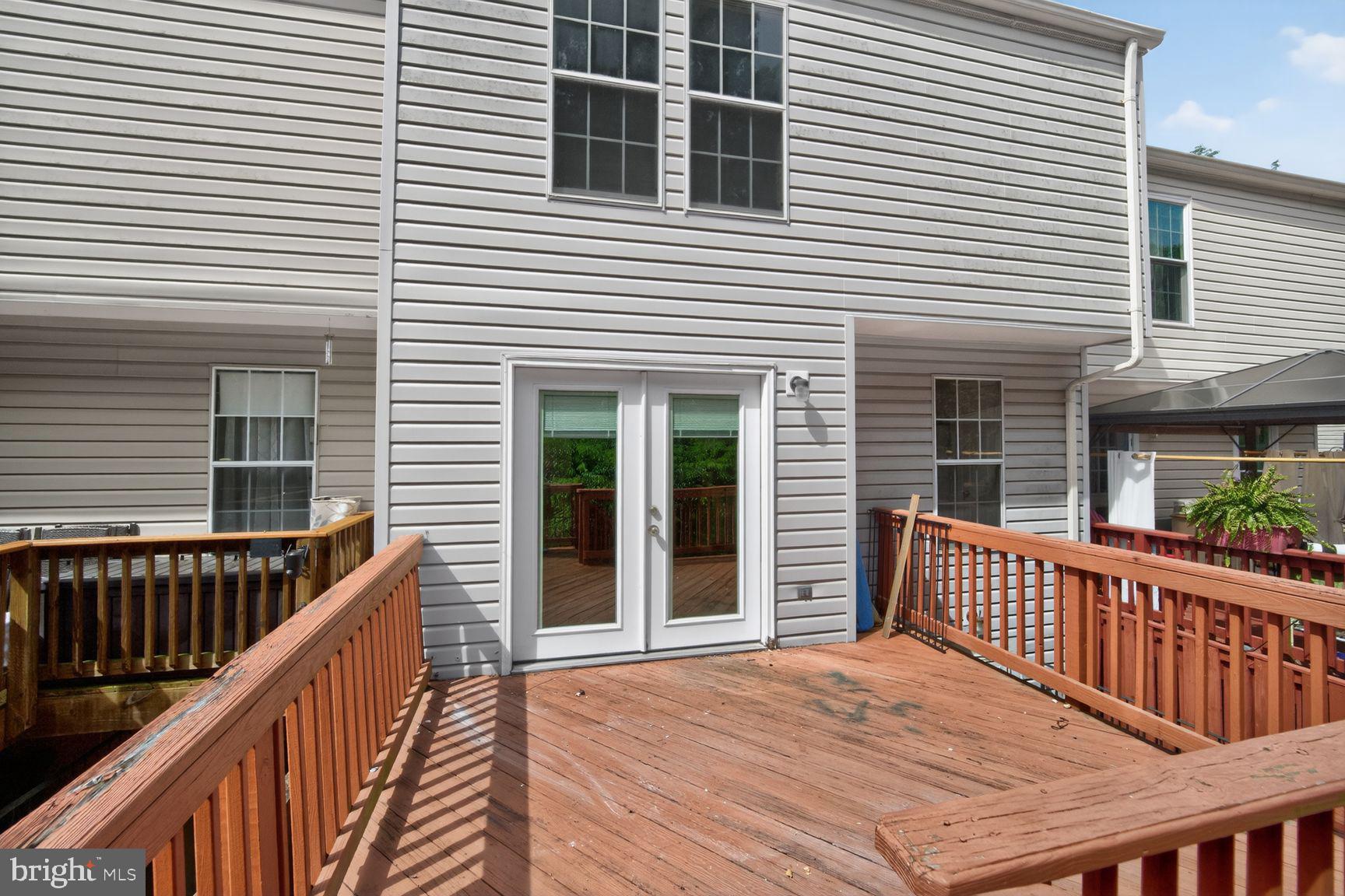 2518 Summers Ridge Drive Odenton, MD 21113 - Photo 28 of 35 Spacious deck for outdoor living.