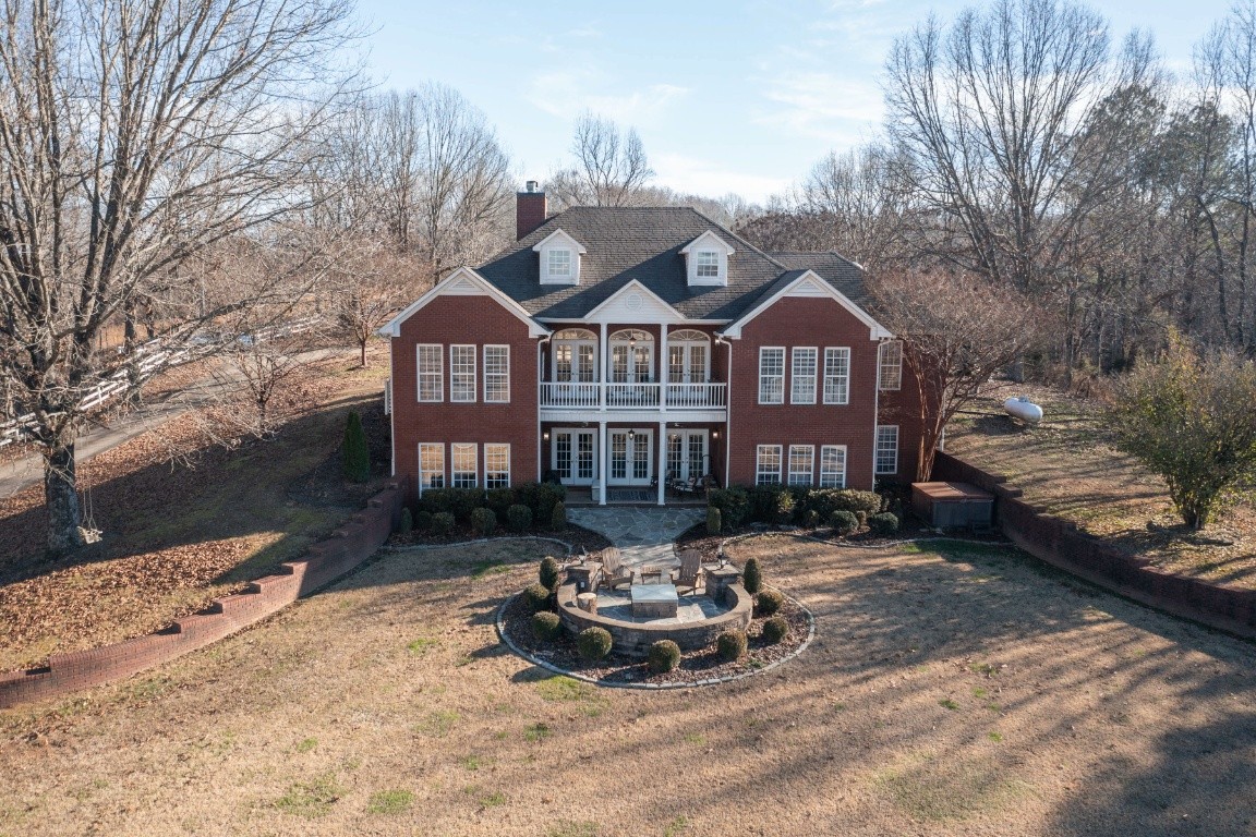 1787 Hagan Road Prospect, TN 38477 - Photo 54 of 57 a front view of a house with a yard outdoor seating and covered with snow
