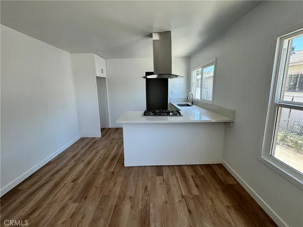 a view of kitchen with furniture and window