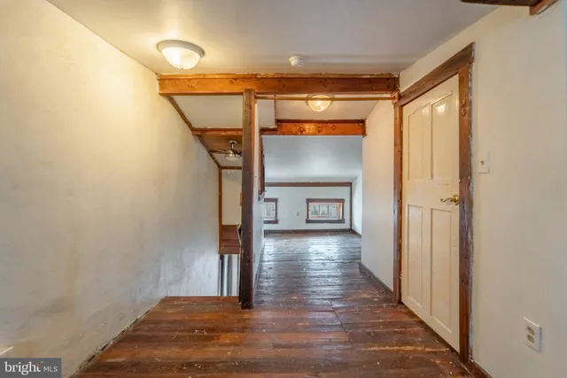a view of entryway with wooden floor