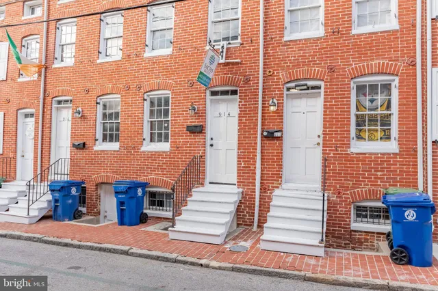 a front view of a building with glass windows