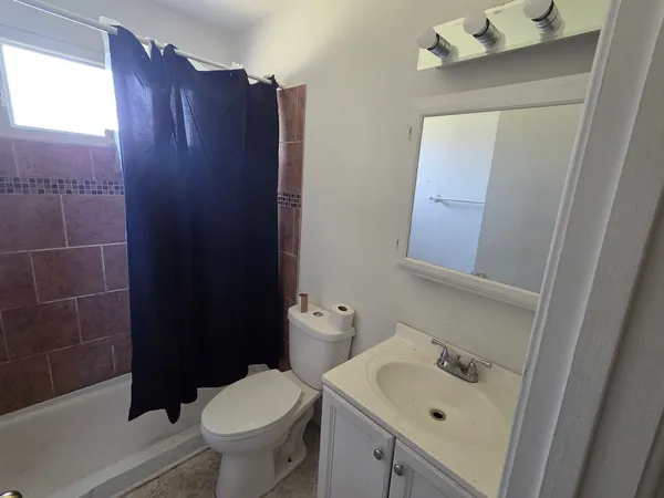 a bathroom with a sink and a toilet