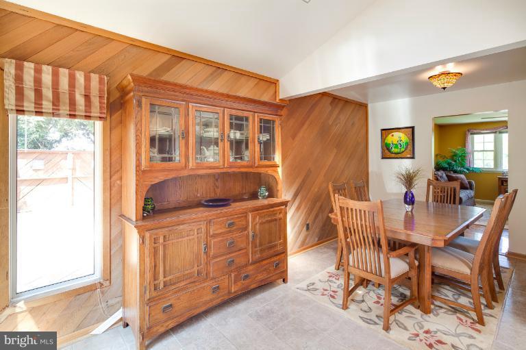 1914 Suffolk Road Finksburg, MD 21048 - Photo 11 of 30 a kitchen that has a dining table and chairs in it