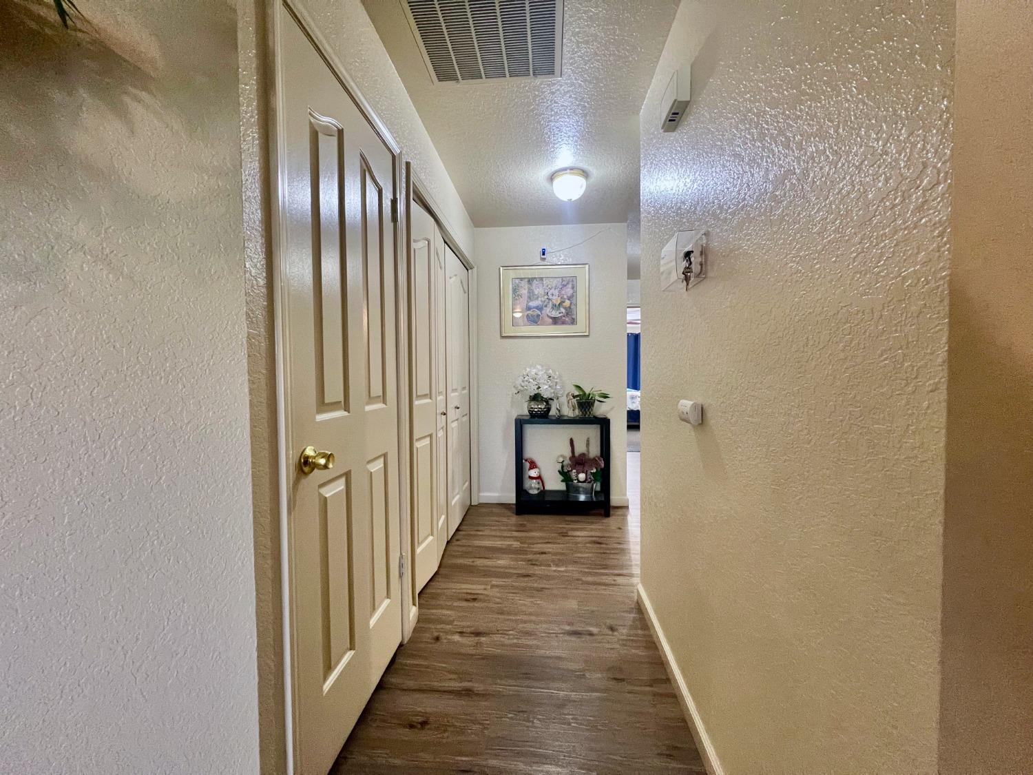 3116 Larrynell Drive Ceres, CA 95307 - Photo 11 of 32 a view of a hallway with a livingroom and a hallway