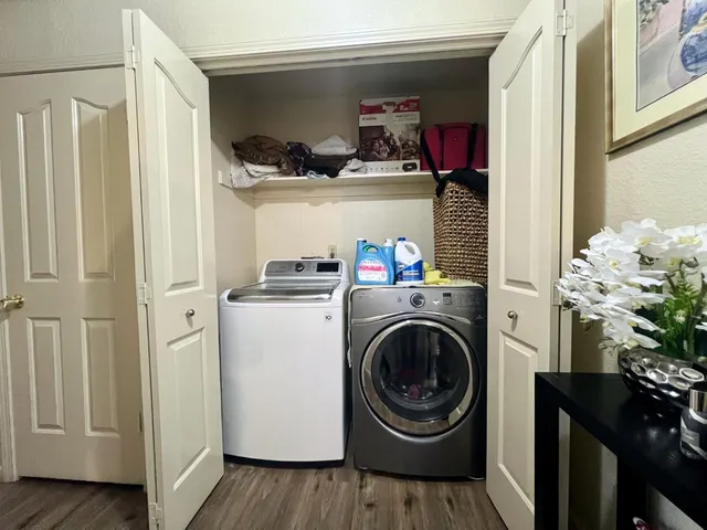 a utility room with dryer and washer