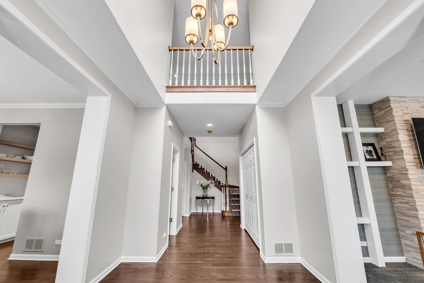 2500 Stonebridge Lane Northbrook, IL 60062 - Photo 2 of 11 a view of entryway with stairs and wooden floor