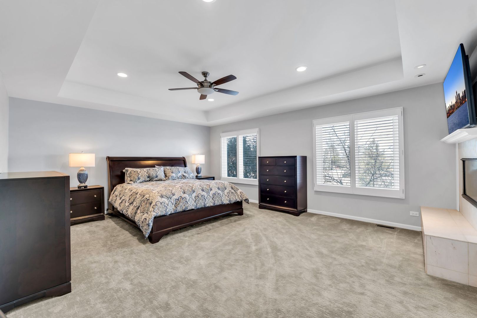 2500 Stonebridge Lane Northbrook, IL 60062 - Photo 9 of 11 a bedroom with a bed closet and a flat tv screen