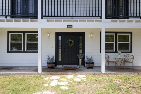a view of a entryway door front of house