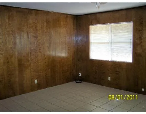 a bathroom with a sink and a window