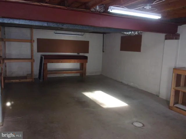 a view of room with a flat screen tv