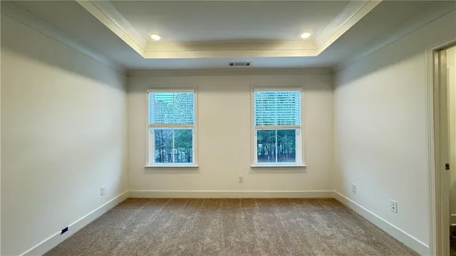 a bathroom with a shower sink and mirror