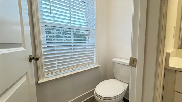 a view of balcony with a potted plant