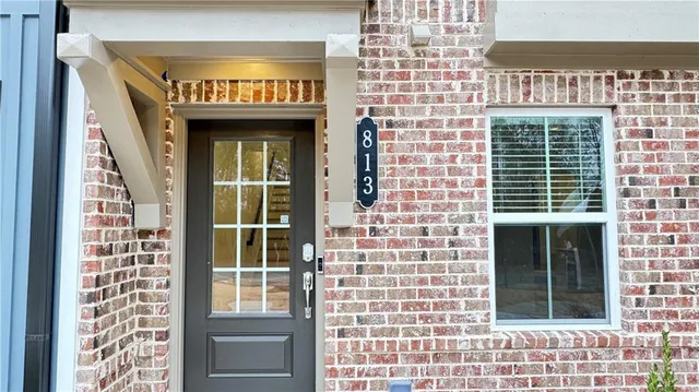 a swimming pool with outdoor seating and yard