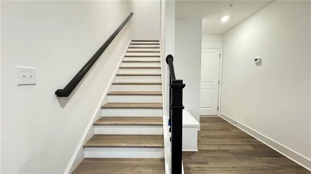 a view of entryway with wooden floor