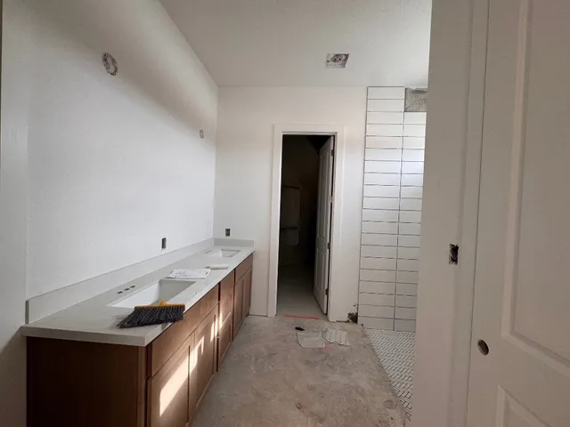 a room with gym equipment and a window