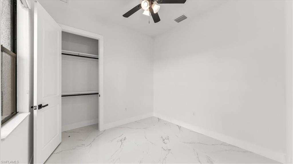 766 Roma Avenue South Lehigh Acres, FL 33974 - Photo 20 of 50 a view of an empty room