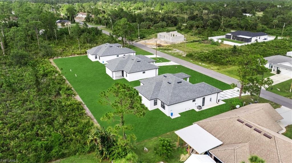 766 Roma Avenue South Lehigh Acres, FL 33974 - Photo 48 of 50 an aerial view of a house