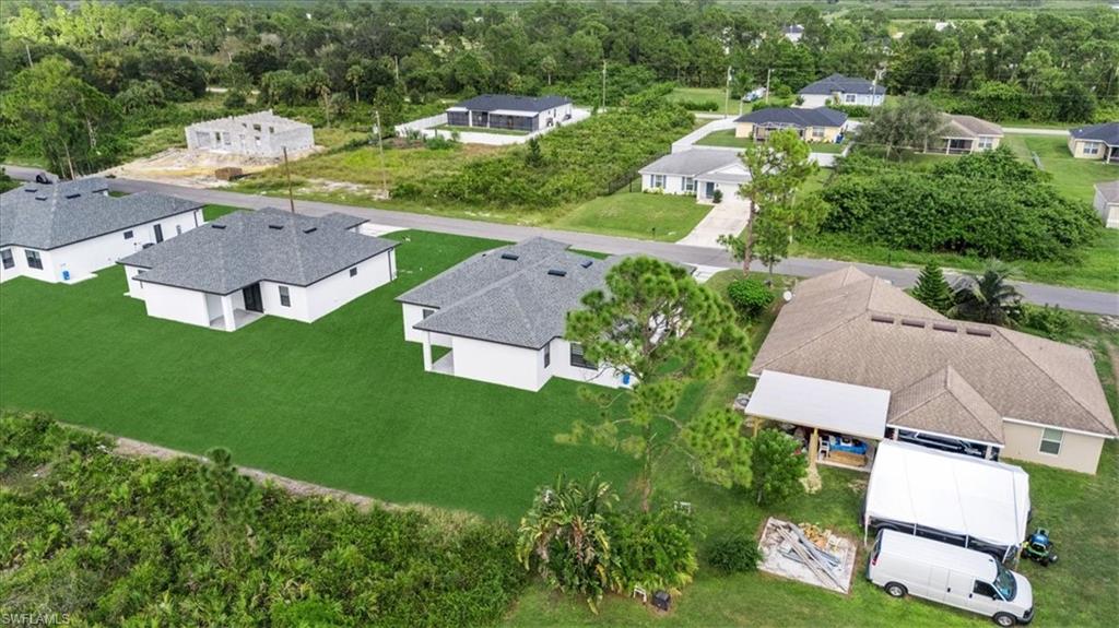 766 Roma Avenue South Lehigh Acres, FL 33974 - Photo 50 of 50 an aerial view of residential houses with outdoor space and street view