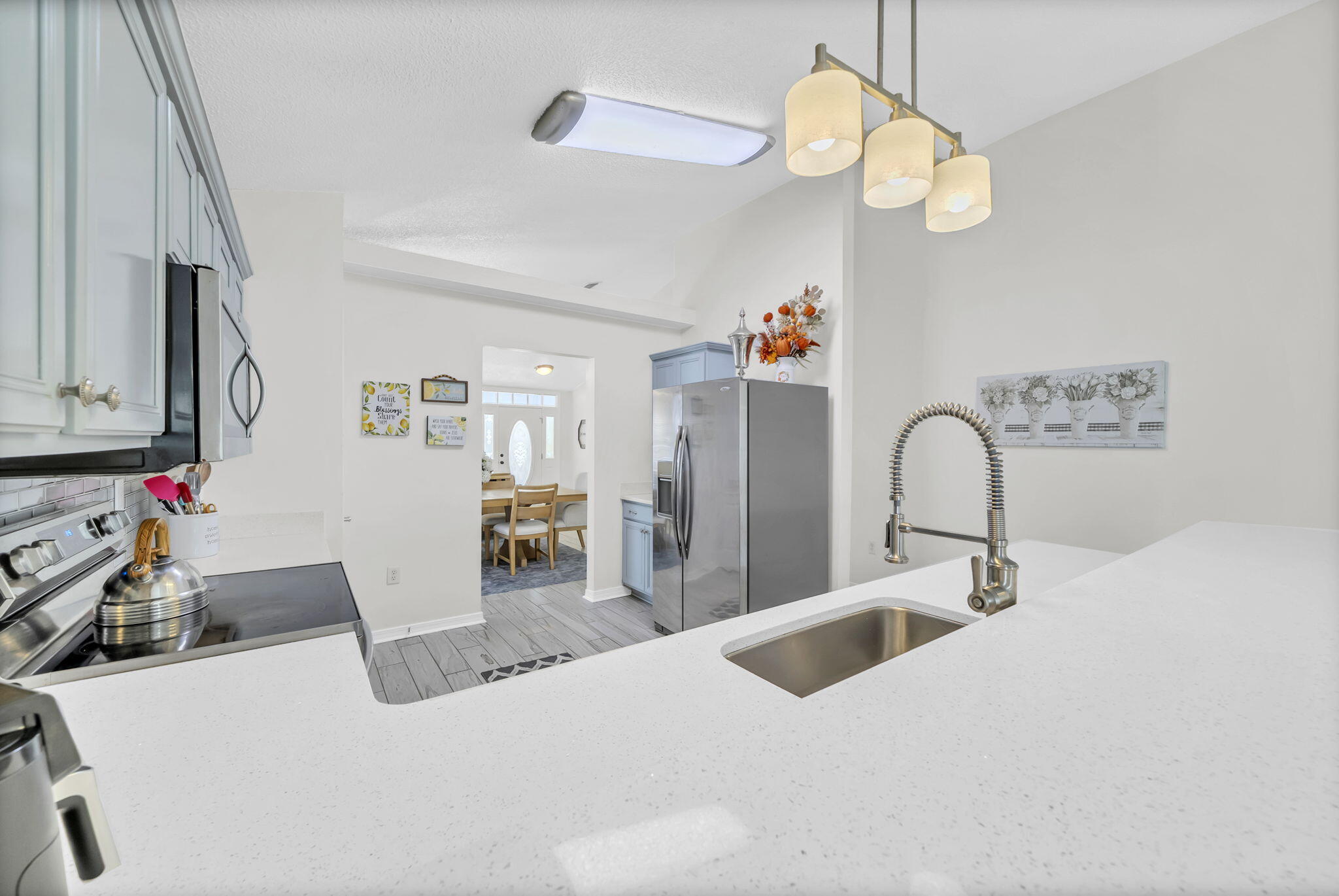 119 Red Bay Court Santa Rosa Beach, FL 32459 - Photo 15 of 36 a kitchen with sink and refrigerator