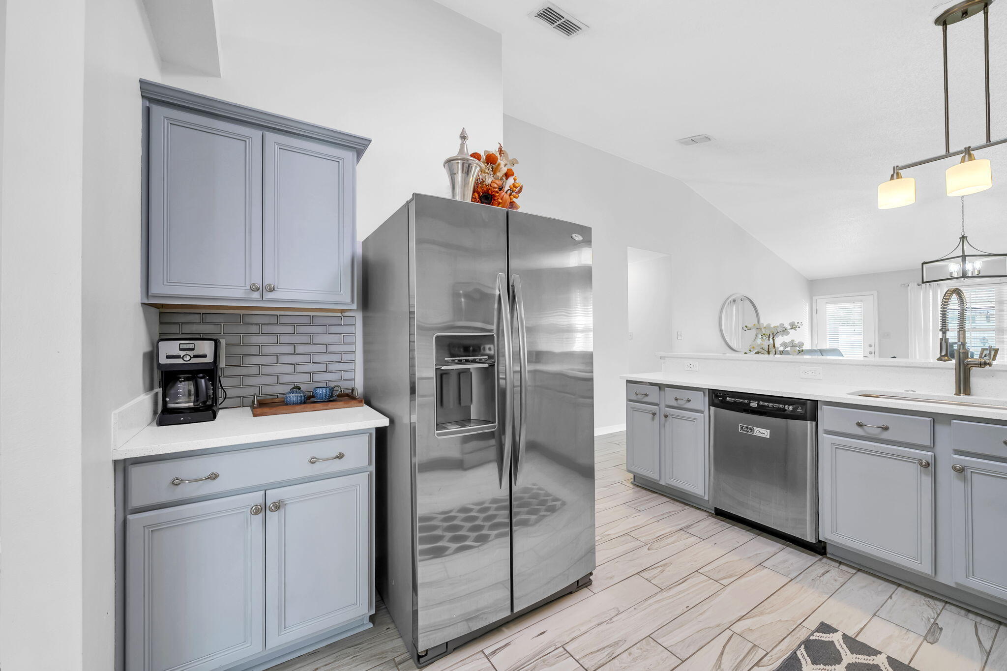 119 Red Bay Court Santa Rosa Beach, FL 32459 - Photo 18 of 36 a kitchen with a sink stainless steel appliances and cabinets