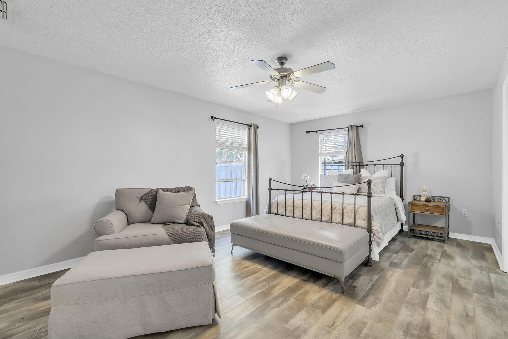 119 Red Bay Court Santa Rosa Beach, FL 32459 - Photo 19 of 36 a bedroom with a bed and couch