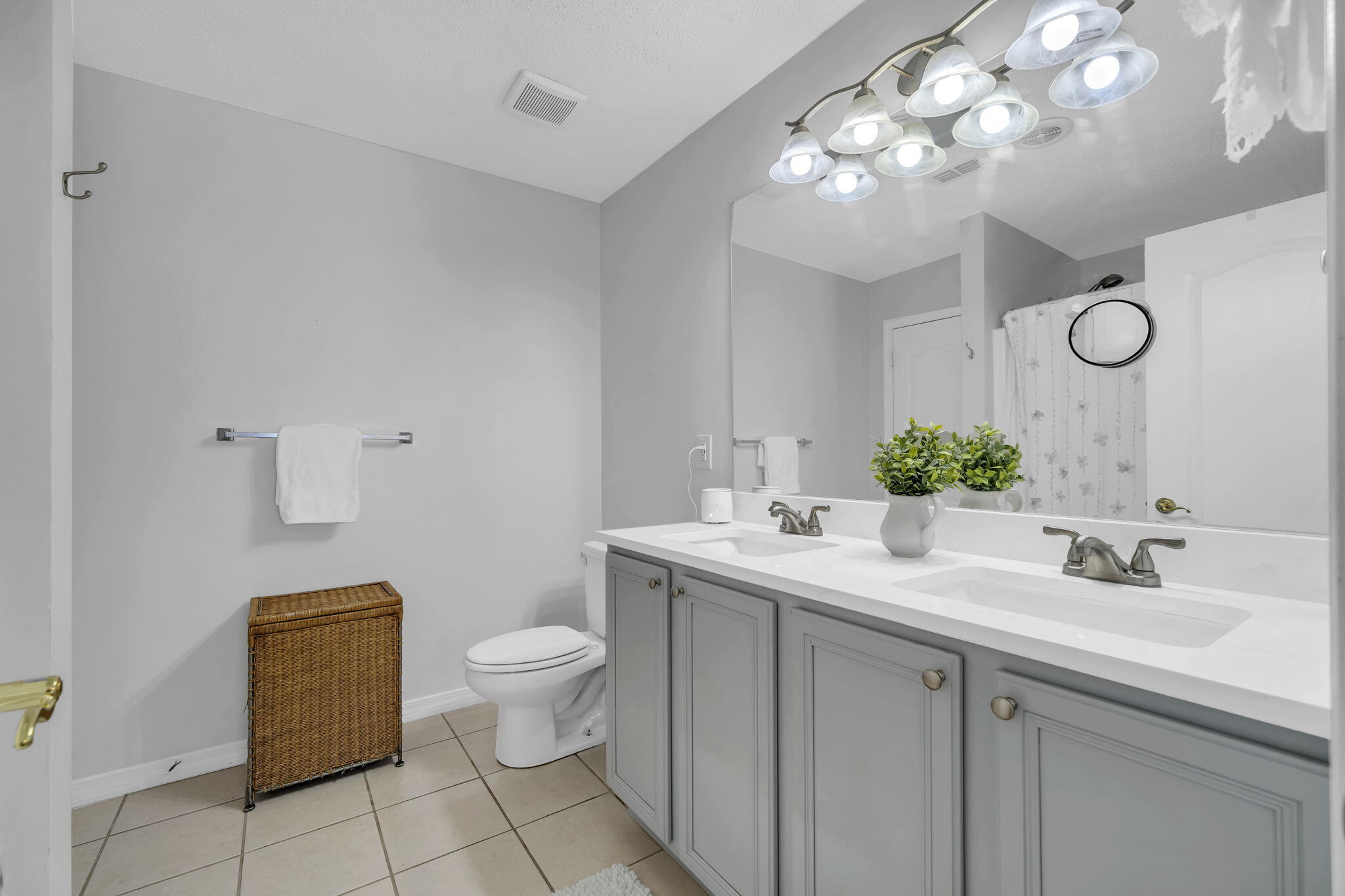 119 Red Bay Court Santa Rosa Beach, FL 32459 - Photo 21 of 36 a bathroom with a sink a toilet and a mirror