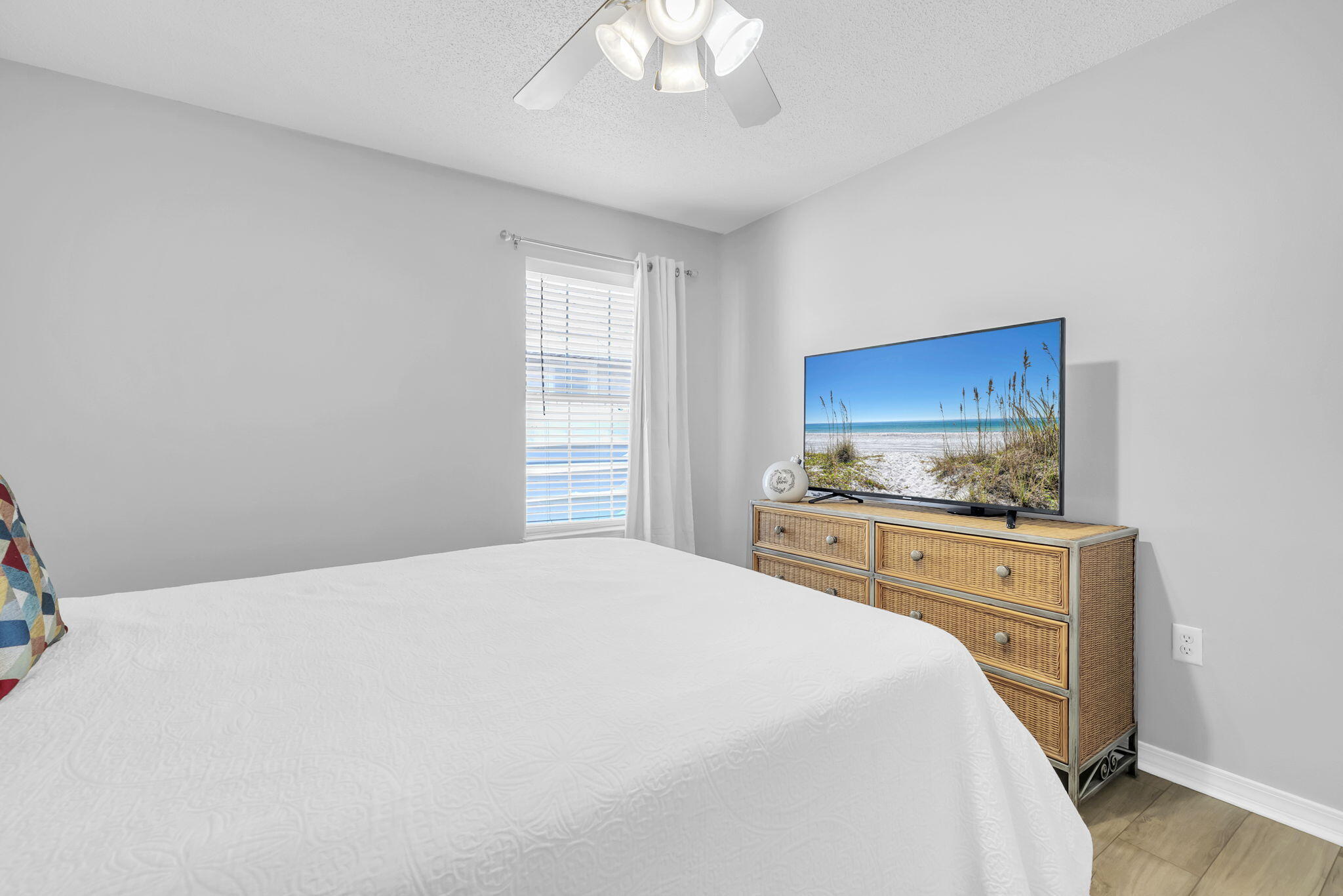 119 Red Bay Court Santa Rosa Beach, FL 32459 - Photo 24 of 36 a bedroom with a bed and a flat screen tv
