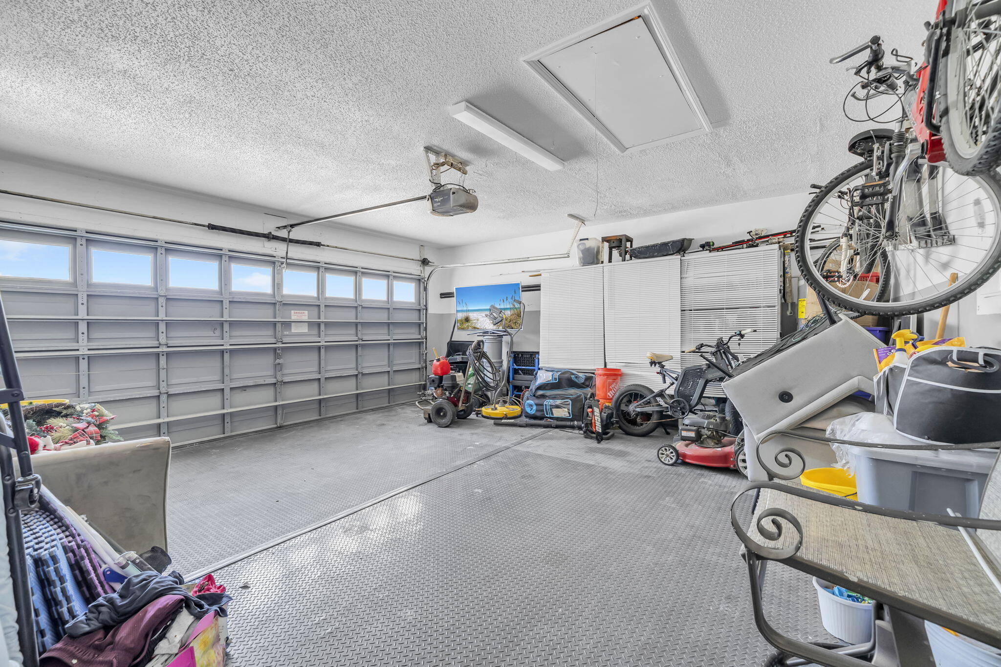 119 Red Bay Court Santa Rosa Beach, FL 32459 - Photo 29 of 36 a view of a garage with rack and bicycle