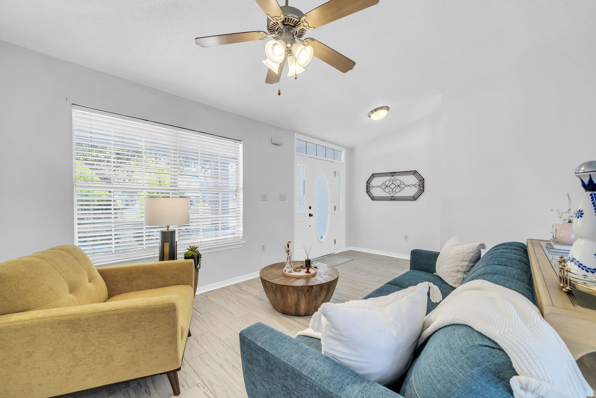 119 Red Bay Court Santa Rosa Beach, FL 32459 - Photo 6 of 36 a living room with furniture and a large window