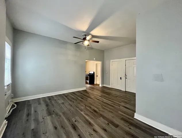 a kitchen with a stove and a sink