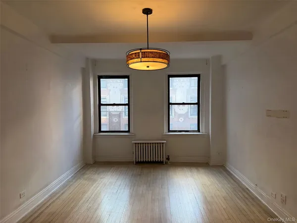 an empty room with windows