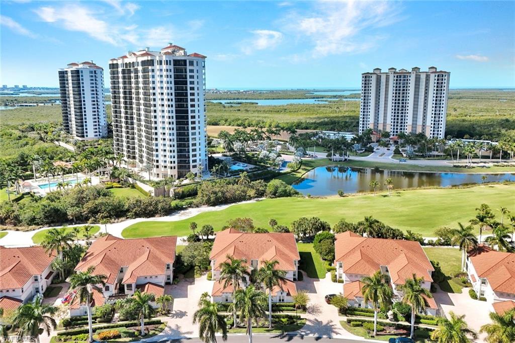 1277 Rialto Way, Unit 201 Naples, FL 34114 - Photo 26 of 46 a view of an ocean with a city