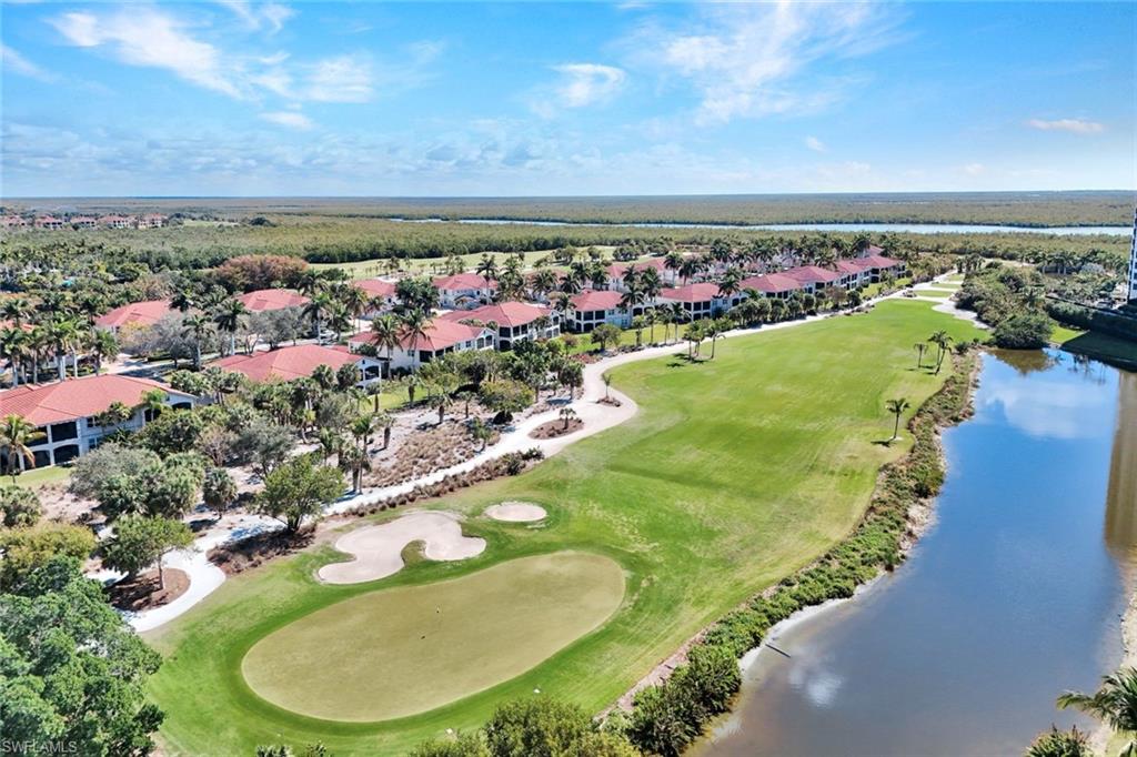 1277 Rialto Way, Unit 201 Naples, FL 34114 - Photo 30 of 46 an aerial view of a residential houses with outdoor space
