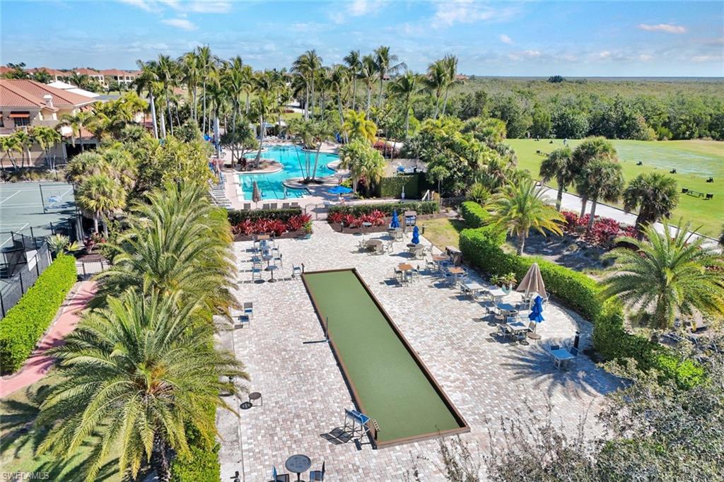 1277 Rialto Way, Unit 201 Naples, FL 34114 - Photo 35 of 46 an aerial view of a house with a yard and lake view