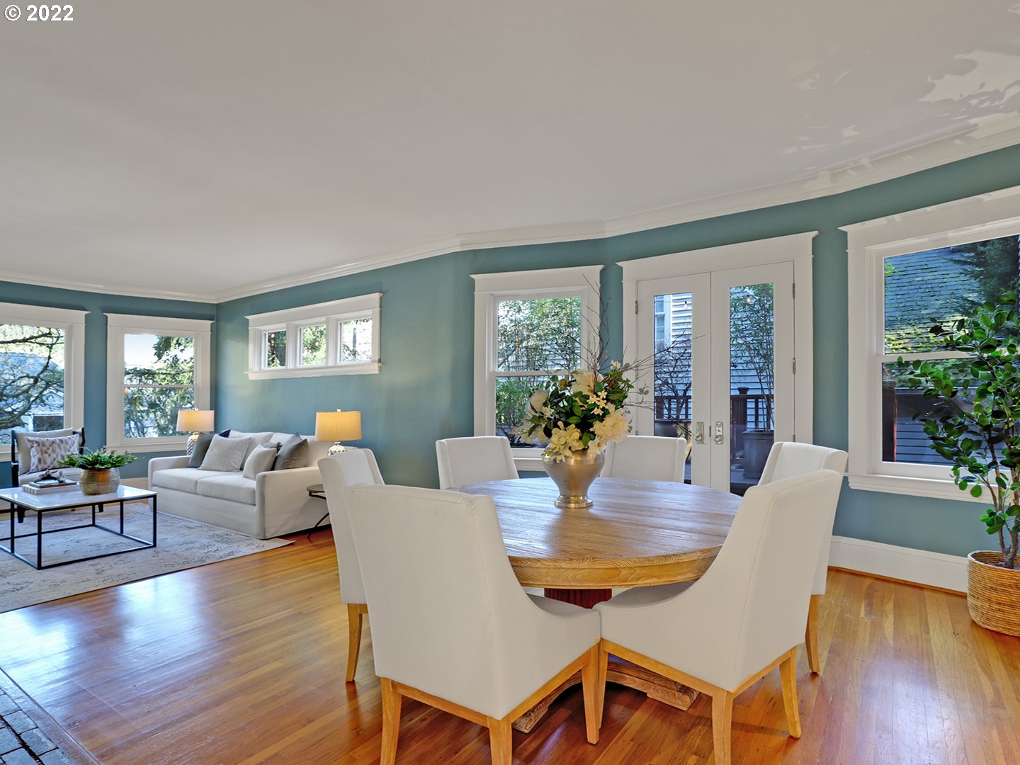 2922 Southwest Periander Street Portland, OR 97201 - Photo 8 of 32 a view of a dining room with furniture window and wooden floor