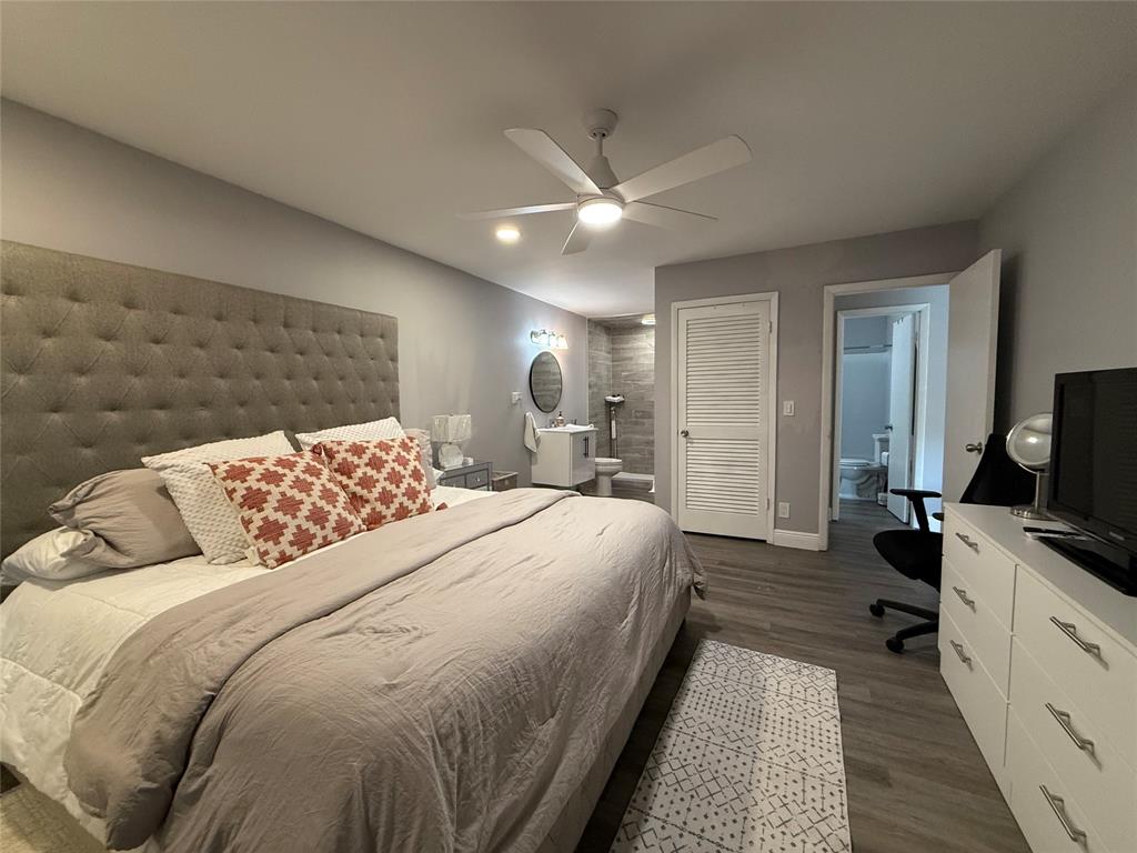 20862 Vinesta Circle Boca Raton, FL 33433 - Photo 11 of 19 a spacious bedroom with a bed and a flat screen tv