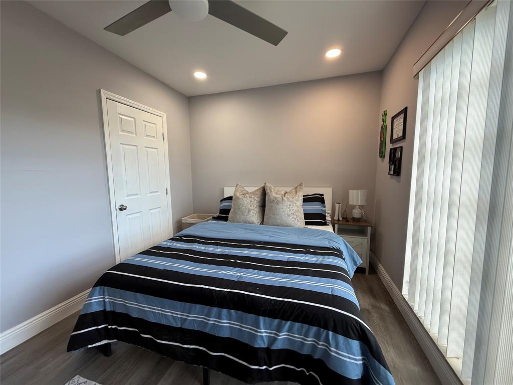 20862 Vinesta Circle Boca Raton, FL 33433 - Photo 14 of 19 a bedroom with bed and a window
