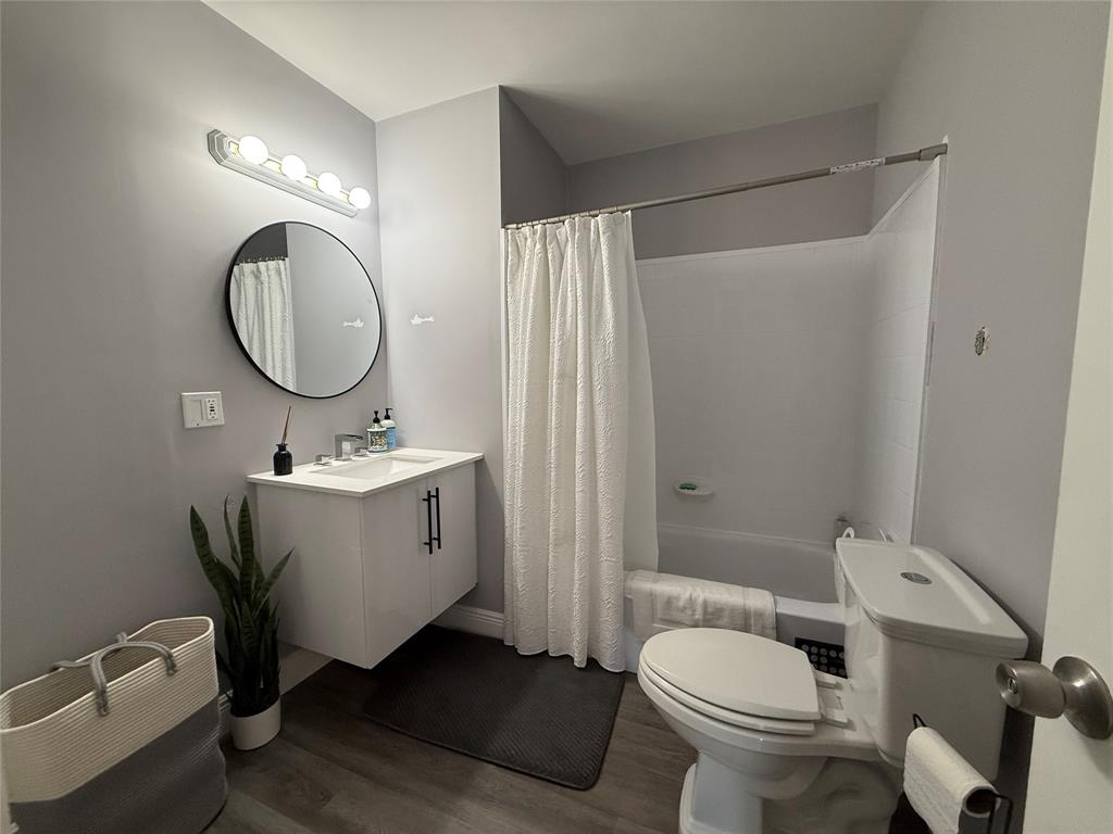 20862 Vinesta Circle Boca Raton, FL 33433 - Photo 16 of 19 a bathroom with a toilet sink and mirror
