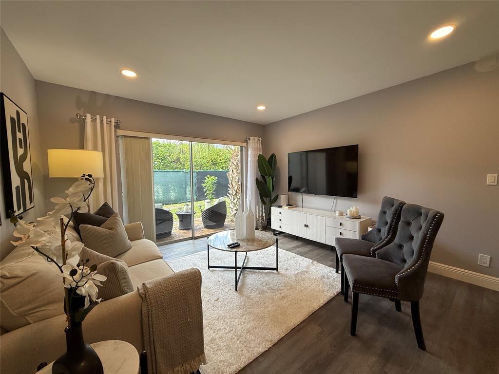 20862 Vinesta Circle Boca Raton, FL 33433 - Photo 7 of 19 a living room with furniture and a flat screen tv