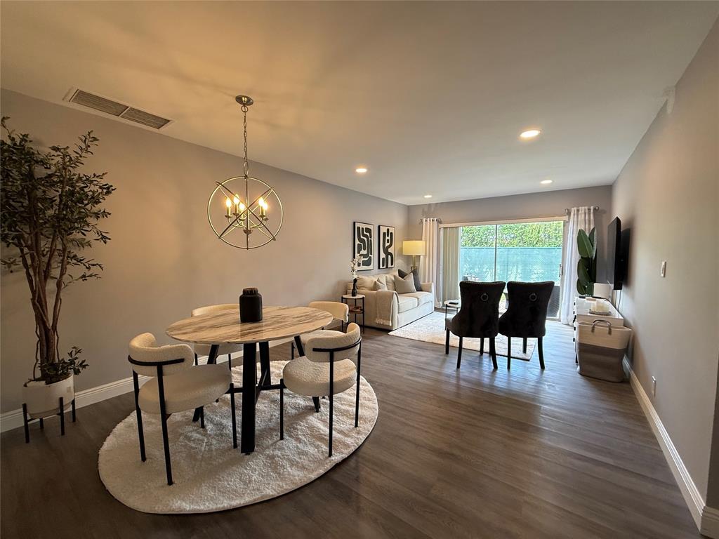 20862 Vinesta Circle Boca Raton, FL 33433 - Photo 9 of 19 a view of a dining room with furniture window and wooden floor