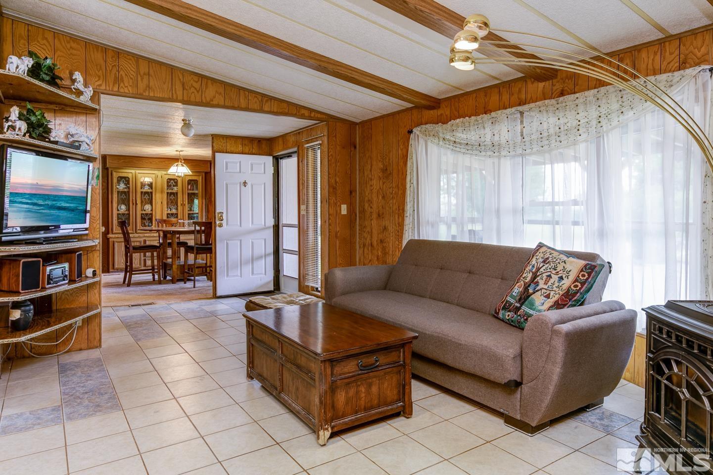 3057 Casey Road Fallon, NV 89406 - Photo 6 of 33 a living room with furniture and a flat screen tv