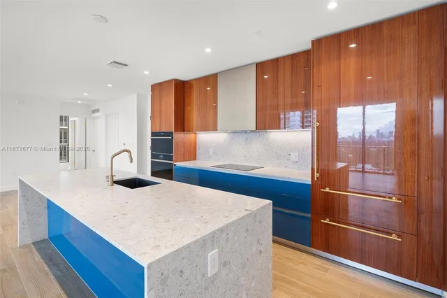 a bathroom with a bathtub and a sink