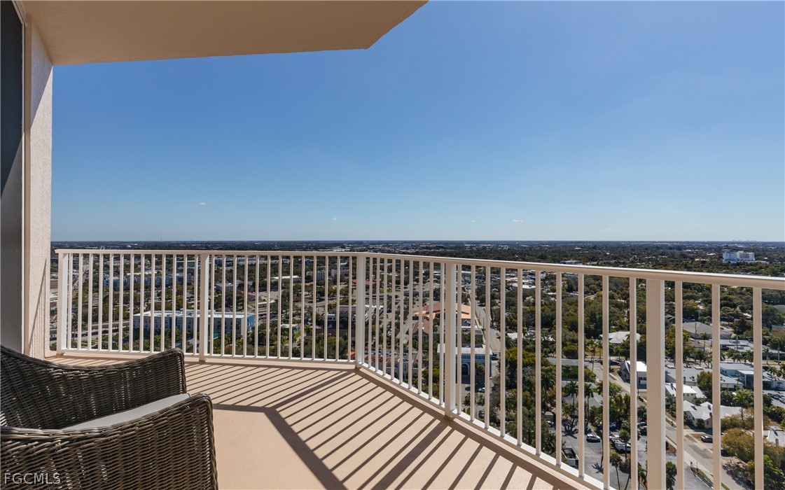 2090 West First Street, Unit J2510 Fort Myers, FL 33901 - Photo 18 of 50 a balcony with wooden floor