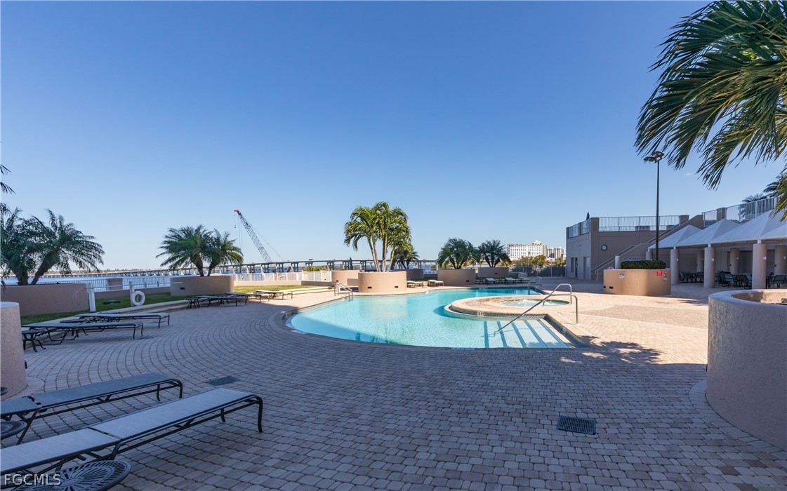 2090 West First Street, Unit J2510 Fort Myers, FL 33901 - Photo 30 of 50 swimming pool view with a garden space