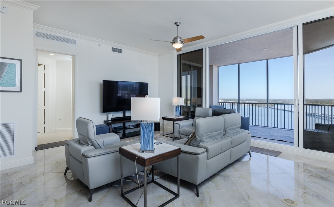 2090 West First Street, Unit J2510 Fort Myers, FL 33901 - Photo 6 of 50 a living room with furniture