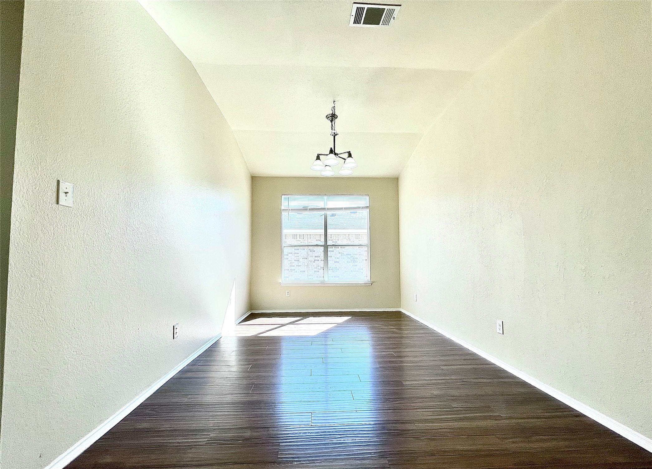 508 Emma Rose Trail Leander, TX 78641 - Photo 29 of 40 Natural light illuminates the rich hardwood flooring in this versatile, open room.
